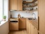 Aménager petite cuisine studio : le plan en L qui fait tenir 4 zones sur 6 m²
