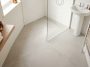 Petite salle de bain studio astuces : la douche italienne qui gagne 40 cm au sol